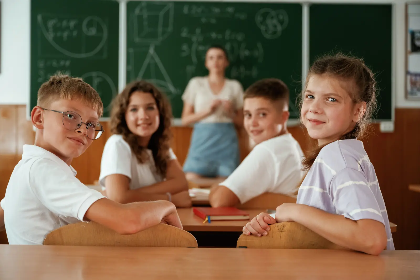 A teacher and pupils together in a Kent classroom